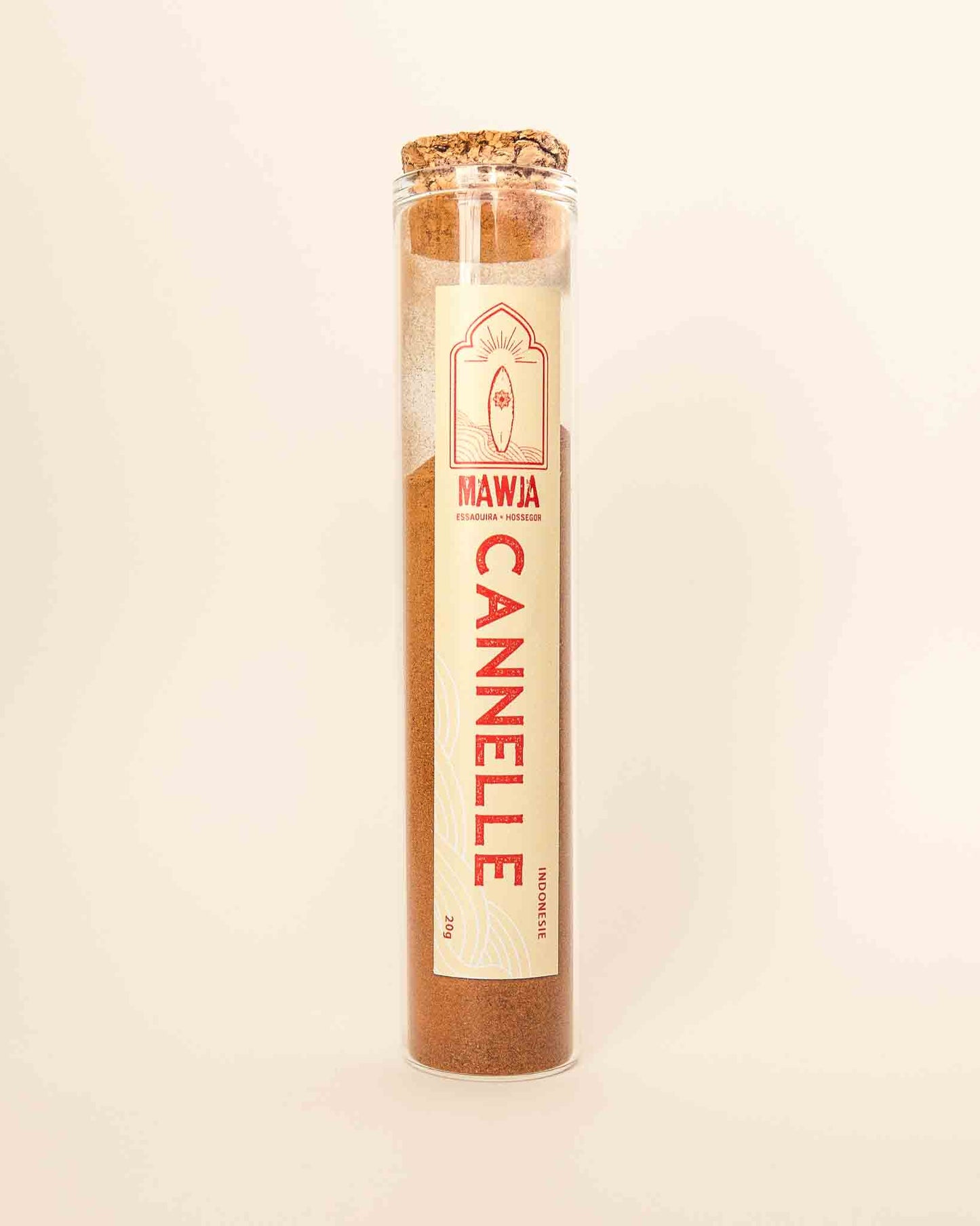 épices mawja cannelle tube verre face fond blanc